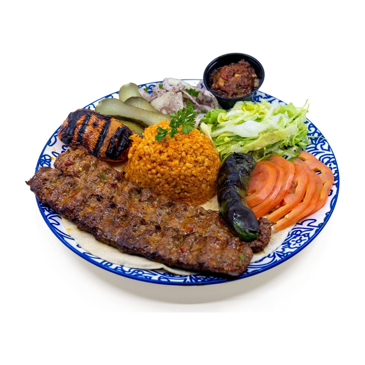 Adana Kebab w/ Rice, a spiced kebab off the skewer